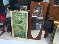 A Victorian recycle hanging beveled edge mirror 50x140 Cm. with a large 1960s retro picture 60x110 Cm.