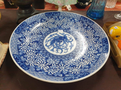 A beautiful large Oriental hand painted blue and white porcelain charger signed with the original price receipt to the back.W.46 Cm. This item would of cost 22,000-23,000B. 