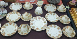 21 pieces English Sutherland hand painted porcelain tea set. Sold as seen