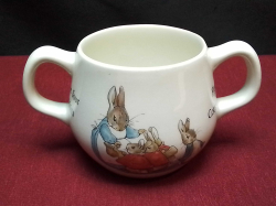 A Wedgewood Estoria Peter rabbit 2 handled cup. W.13 H.7 Cm.