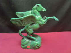 A vintage bronze flying horse stamped. W.21 H.23 Cm.