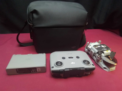 DJ Mini Drone with accessories and case. 