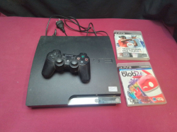Play Station 3 Machine with 1 Join controller and 2 Boxed of games.