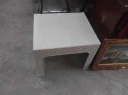 A Small Rattan Style Coffee Table. W.46 L.54 H.46 Cm.
