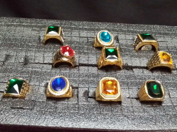 10 Gold plated gemstone rings.