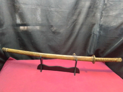 A vintage hand painted golden samurai L.91 Cm.  sword on stand