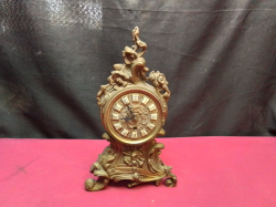 Ornate ItalianRococo style, Bronze intricate foliage, mantel clock, no key, no front glass. H.27 W.16 Cm.