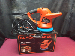 A Black + Decker Polisher. 