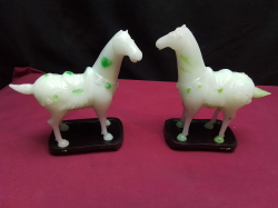 2 Jade horses with stands in a box. W.14 H.15 Cm.