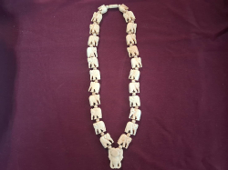 An Elephant bone carved necklace