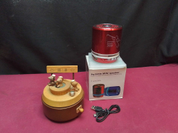 A Wooden Musical box 3 Pigs and A Portable Mini Speaker. 