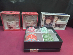 4 Boxes of new Mugs.