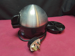A Neo 3 in 1 electric  egg boiler, poacher and Steamer.
