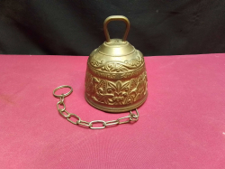 A vintage brass bell. W.9 H.10 Cm.