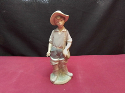 A LLADRO Figure of Boy Going Fishing.W.8 H.22 Cm.