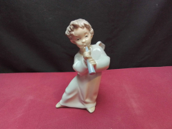 A LLADRO Figure of Angel with Flute. W.8 H.16 Cm.