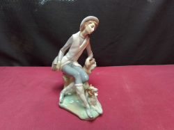 A LLADRO Figure of Angel with Flute. W.15 H.19 Cm.