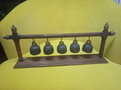 A Nice Set of Bronze Temple bells on a wooden stand