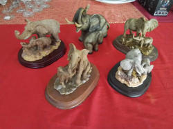 5 Elephant figures.
