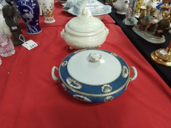 A Blue Tureen with Lid and a Round White Tureen with Lid.