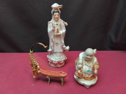 A Chinese  Guan Yin and A Happy Buddha and 1 other.