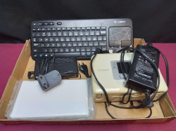 A Canon Photo Printer and Logitech WiFi Keyboard.