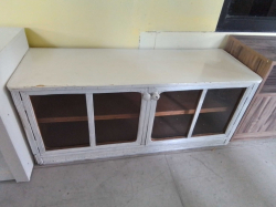 A Lower Rattan Cupboard with Glass Doors. W.43 L.120 H.52 Cm.