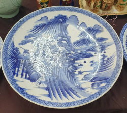 A large oriental blue and white porcelain charger in good condition. W.45 Cm.