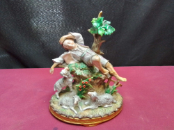 A German Sitzendorf Figure Maked on Base of A Shepkerd and 3 Sheeps. W.16 H.20 Cm.
