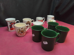 7 Modern Commemorative Mugs and 4 Plain Green Mugs.