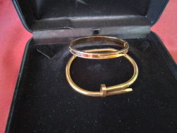 Two beautiful gold Plated stainless steel bracelets.