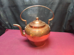 A large copper kettle. W.36 H.35 Cm.