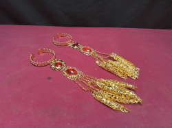 A Pair of Gold Vintage Style Red Beaded Stone Claw Bangle Dancing Bracelets. 