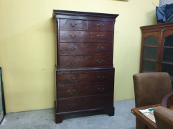 An early George III 
C,1760- 1770 mahogany chest on chest with the original swan neck brass handles the original bracket  feet with brushing slide and reeded counted corners with Greek key  pelmet. W.112 D.53 H.188 Cm.