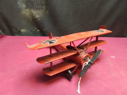 A Tin Model of A Germany WW1 Biplane.
