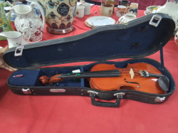 A Nicex Violin in case (lacking Bow)