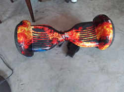 A 2 Wheeled Dindi with Charger.