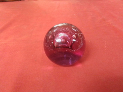 A Pink Glass Paperweight. W.8 H.7 Cm.