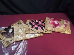 4 raffia woven clutch handbag new. 18x29 Cm. 