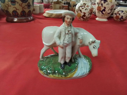 An Old Stafordshire Figure of A Farmer and A Cow Circa 1860( Chip to cow ear! W.16 H.17 Cm.