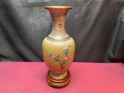 A Tall Cloisonné Vase Yellow and Green with Flower Decoration with Wooden Stand.W.14 H.31 Cm.