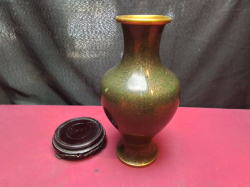 A Lovely Dark Green Cloisonné Vase with wooden Stand. W.14 H.26 Cm.