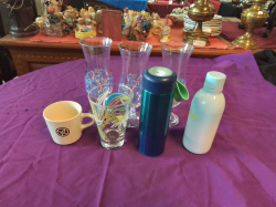 4 Color Glasses, 1 Small Mug and 2 cool water bottles. 