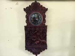 A beautiful one piece hand carved with two female deer  and two stag  deers in woodland scene black forest style clock. W.37 H.90 Cm.  sold as seen