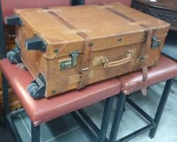 A vintage retro style leather  travelling suitcase  with beautiful  blue silk lining H.63 W.36 D.22 Cm.
This item would make a good  shop display  or for classic vehicle