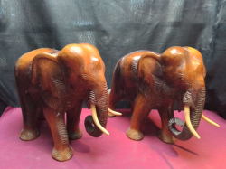 A Pair of Wooden Elephant Statues. L.37 H.30 Cm.