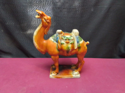 A Chinese Tang Sancai Camel tri colored glazed Pottery. W.23 H.28 Cm.