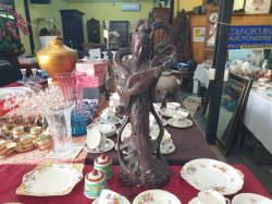 An old probably  19th century oriental hand carved one piece figurine in untouched original  good condition. W.23 H.64 Cm.