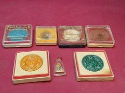 7 Thai boxed amulets 