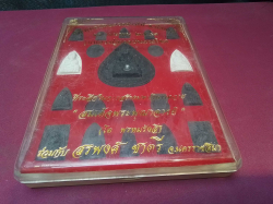 A boxed set of 20 amulets.18x23 Cm.